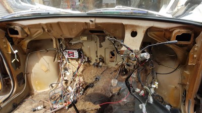 Dash removed with wiring exposed