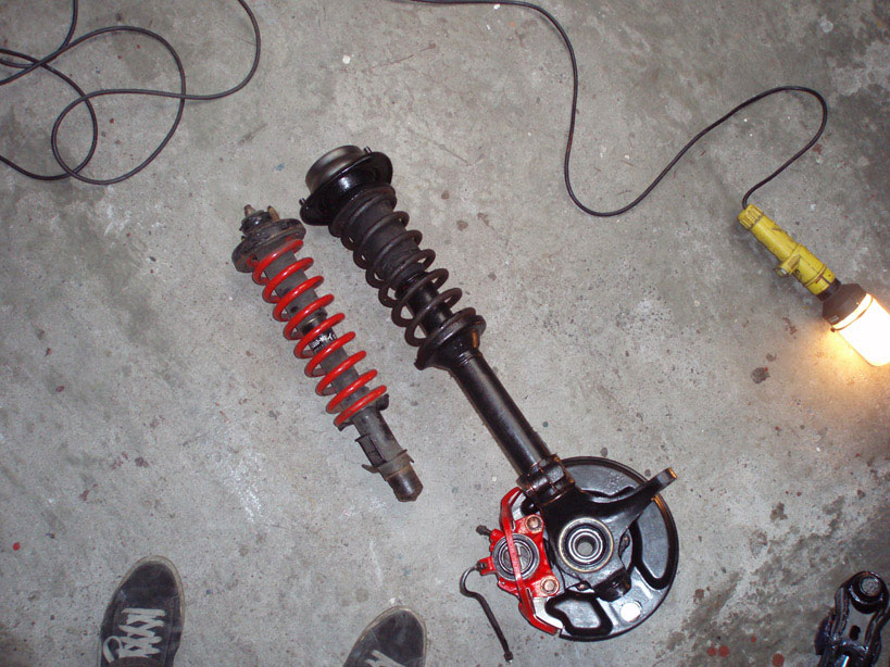 Original shock compared with a CRX shock..needs some work before fitting..there's always hope!