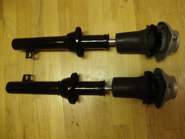 front shocks awaiting the springs